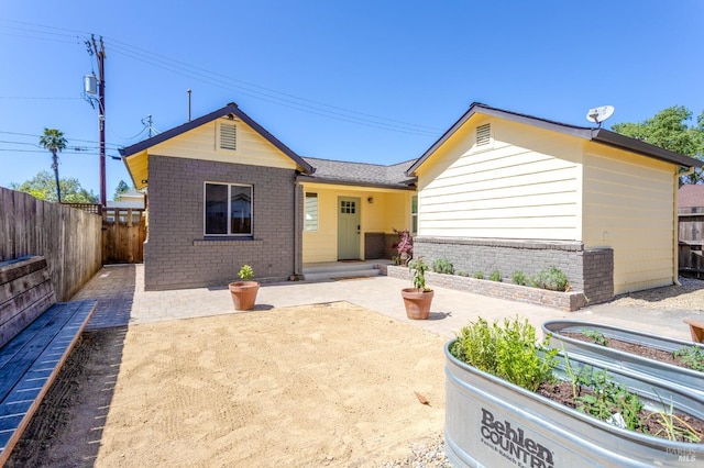 16 Adeline Way, Healdsburg, CA 95448 - view of front of house with a patio area, fence, and brick siding