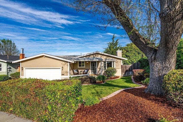 1811 Pacifica Ct, Benicia, CA 94510 - ranch-style home with a front yard, fence, a garage, and a chimney
