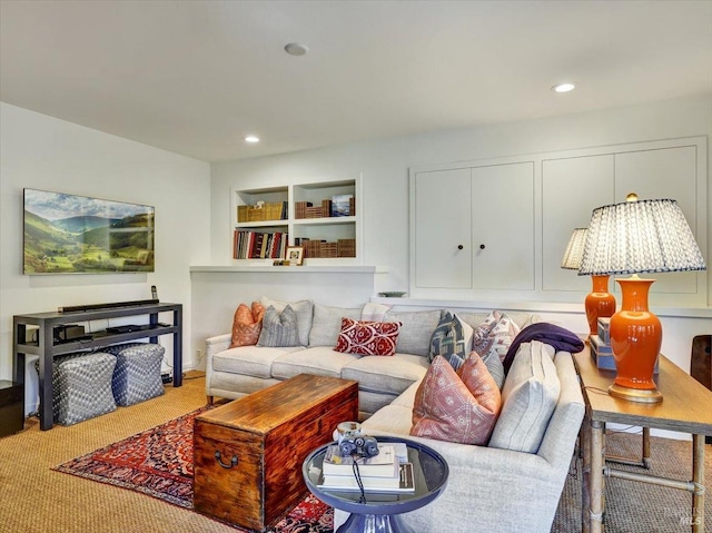 carpeted living area featuring recessed lighting