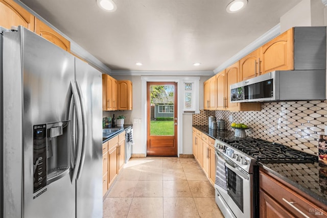 1595 Cinnamond St, Napa, CA 94559 - kitchen featuring stainless steel appliances, decorative backsplash, crown molding, recessed lighting, and light tile patterned floors