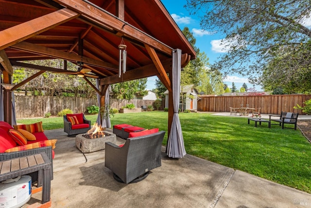 1595 Cinnamond St, Napa, CA 94559 - fenced backyard with a patio area, an outdoor living space with a fire pit, a shed, and a gazebo