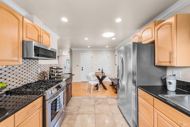 1595 Cinnamond St, Napa, CA 94559 - kitchen with appliances with stainless steel finishes, light brown cabinetry, crown molding, recessed lighting, and backsplash