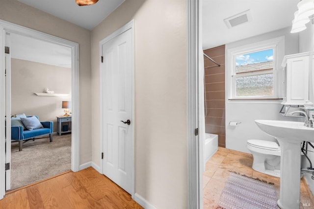 1595 Cinnamond St, Napa, CA 94559 - bathroom featuring  shower combination and wood finished floors