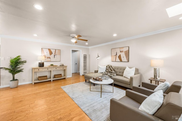 1595 Cinnamond St, Napa, CA 94559 - living room with recessed lighting, a ceiling fan, ornamental molding, light wood-type flooring, and a skylight