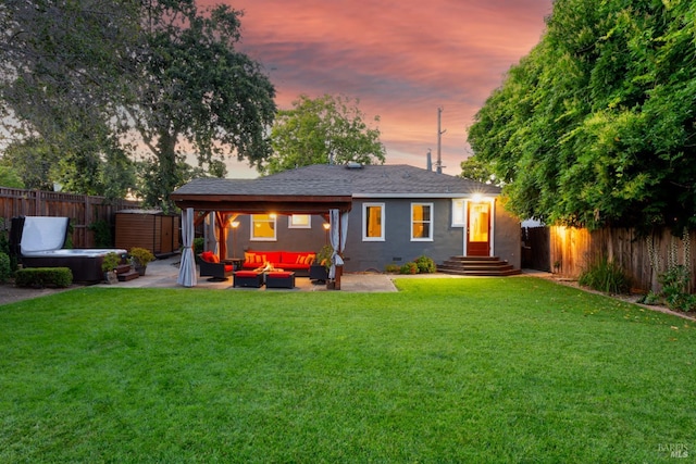 1595 Cinnamond St, Napa, CA 94559 - back of property at dusk featuring an outdoor hangout area, a fenced backyard, and a patio