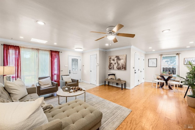 1595 Cinnamond St, Napa, CA 94559 - living room featuring healthy amount of natural light, light wood-style floors, ornamental molding, recessed lighting, and ceiling fan