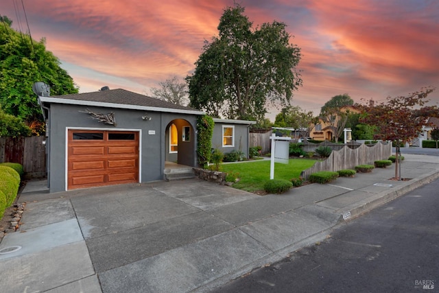 1595 Cinnamond St, Napa, CA 94559 - ranch-style house featuring an attached garage, stucco siding, and driveway