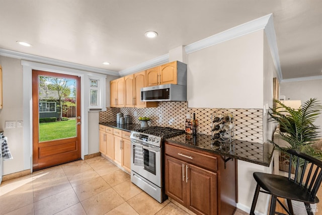1595 Cinnamond St, Napa, CA 94559 - kitchen featuring stainless steel appliances, ornamental molding, backsplash, recessed lighting, and light tile patterned floors