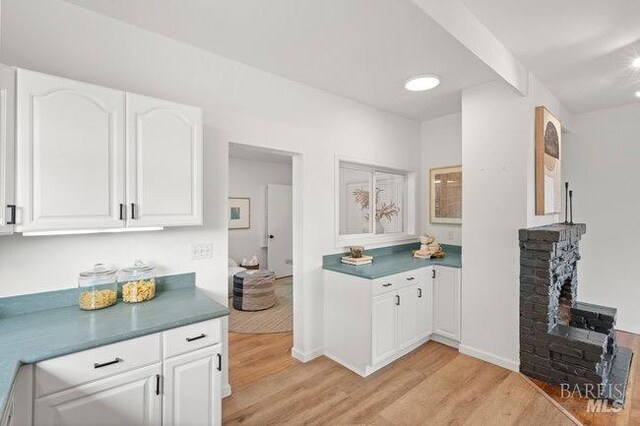 294 Scenic Rd, Fairfax, CA 94930 - bar area featuring light wood-type flooring and baseboards