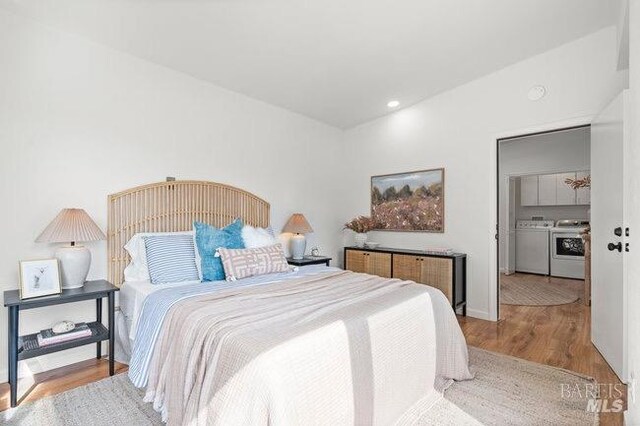 294 Scenic Rd, Fairfax, CA 94930 - bedroom with washer and dryer, wood finished floors, and recessed lighting