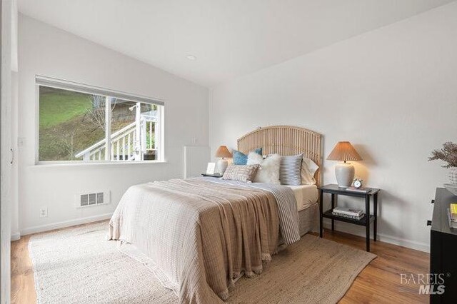 294 Scenic Rd, Fairfax, CA 94930 - bedroom with wood finished floors and baseboards