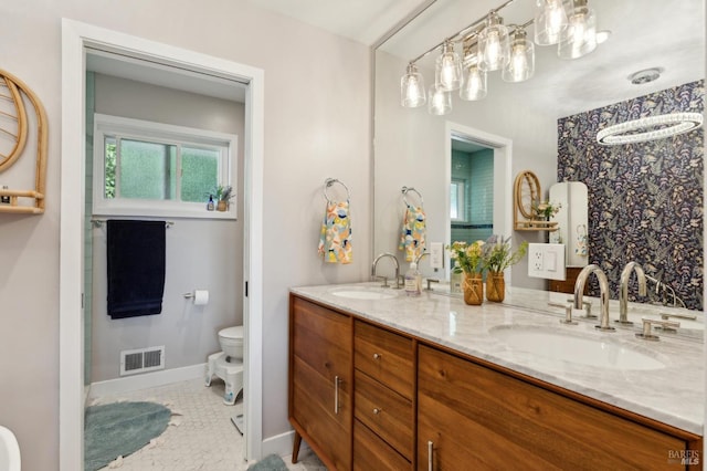 299 Via Barranca, Greenbrae, CA 94904 - full bathroom featuring double vanity, visible vents, a sink, and toilet