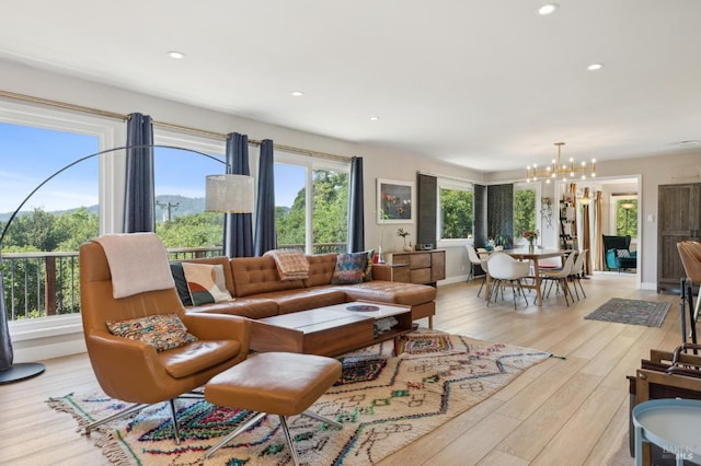 299 Via Barranca, Greenbrae, CA 94904 - living area featuring light wood-type flooring, a notable chandelier, and recessed lighting