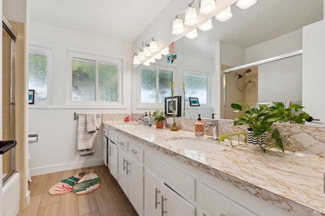 299 Via Barranca, Greenbrae, CA 94904 - bathroom with tiled shower, a sink, and a healthy amount of sunlight