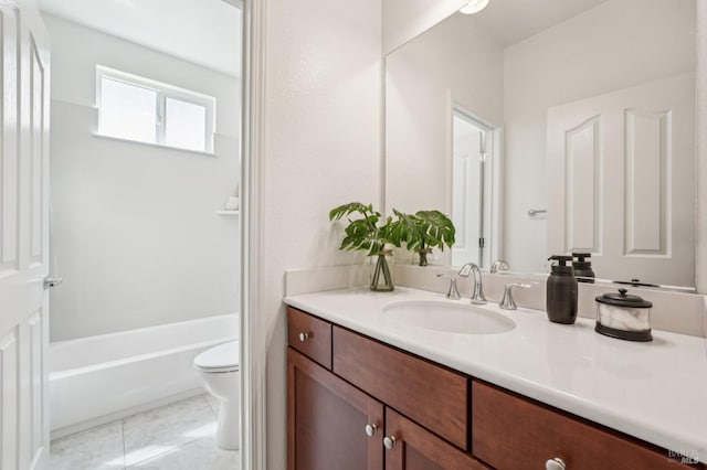 full bath featuring toilet, tile patterned floors, and vanity