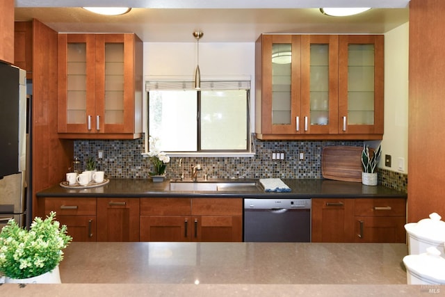 kitchen featuring brown cabinets and stainless steel dishwasher