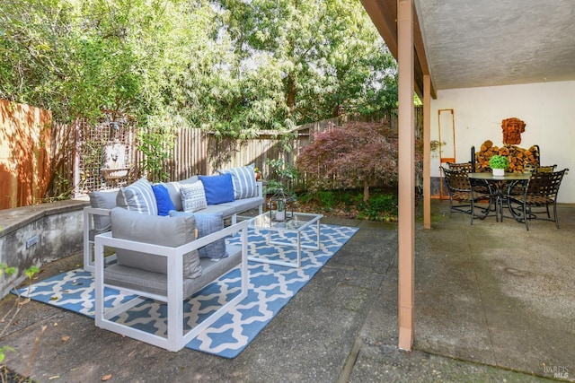view of patio with an outdoor hangout area and a fenced backyard