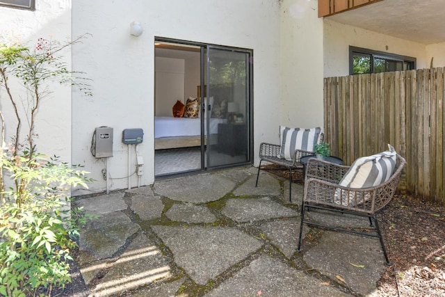 view of patio / terrace featuring fence