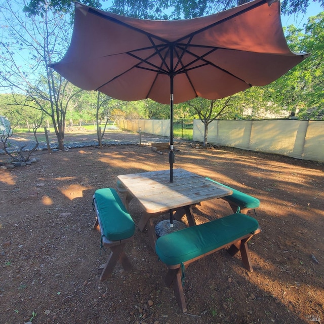 view of property's community with fence