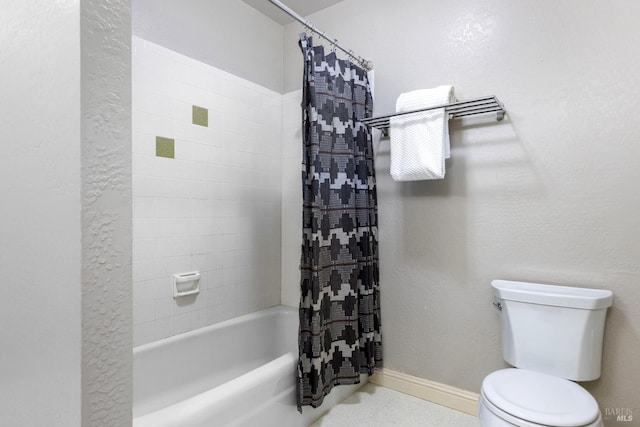 full bath with toilet and shower / bath combo with shower curtain