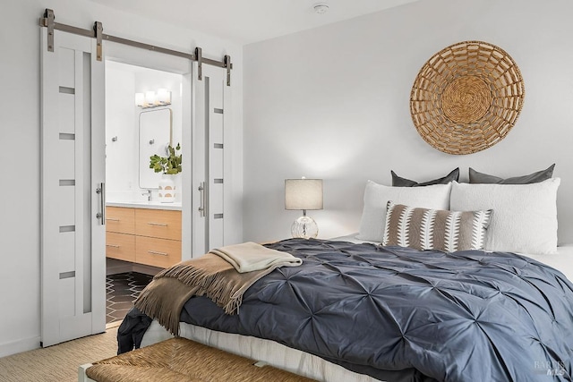 2532 Laguna Vista Dr, Novato, CA 94945 - bedroom with a barn door, light carpet, ensuite bathroom, and a sink