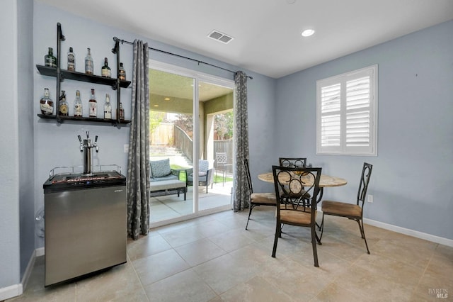 2436 Chuck Hammond Dr, Fairfield, CA 94533 - dining room featuring recessed lighting, visible vents, baseboards, and a healthy amount of sunlight