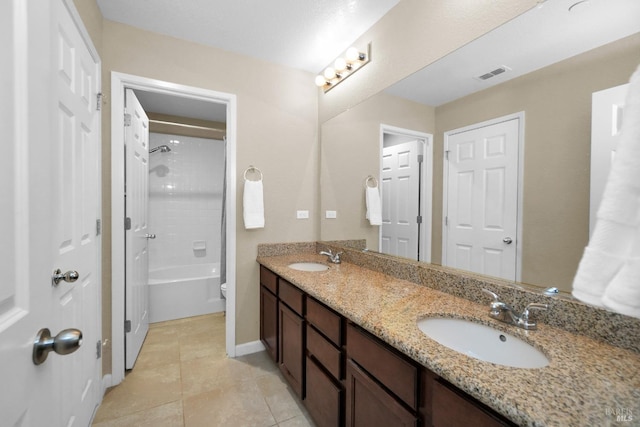 2436 Chuck Hammond Dr, Fairfield, CA 94533 - full bathroom with tile patterned floors, double vanity, visible vents, and a sink