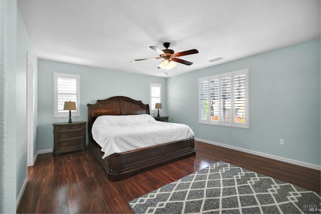 2436 Chuck Hammond Dr, Fairfield, CA 94533 - bedroom featuring wood finished floors, baseboards, multiple windows, and visible vents