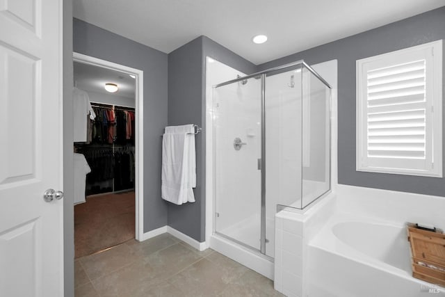 2436 Chuck Hammond Dr, Fairfield, CA 94533 - full bath featuring a shower stall, a bath, a spacious closet, and tile patterned flooring