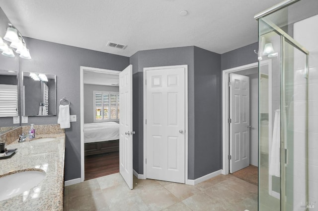 2436 Chuck Hammond Dr, Fairfield, CA 94533 - ensuite bathroom with a shower stall, double vanity, a sink, and visible vents