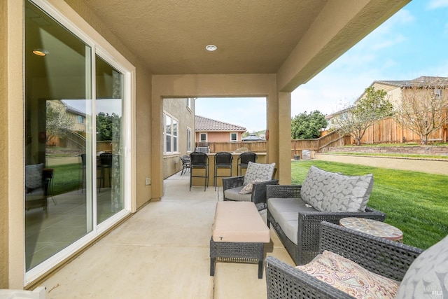 2436 Chuck Hammond Dr, Fairfield, CA 94533 - view of patio featuring outdoor dining area, a fenced backyard, and an outdoor hangout area