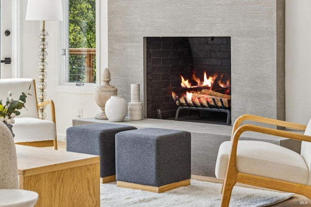 interior space featuring a lit fireplace