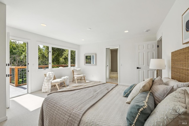carpeted bedroom featuring recessed lighting and access to exterior
