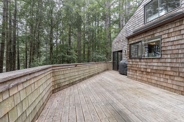 wooden deck with grilling area