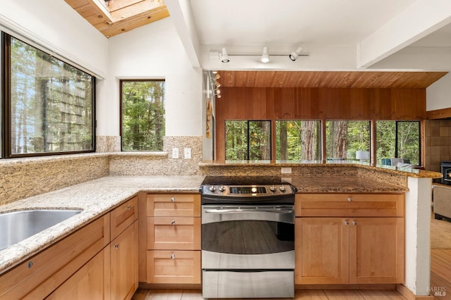kitchen featuring stainless steel electric stove, light stone countertops, wooden ceiling, backsplash, and lofted ceiling with skylight