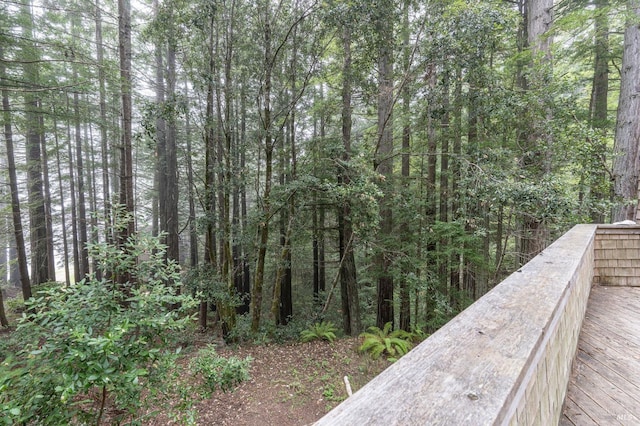 exterior space featuring a view of trees
