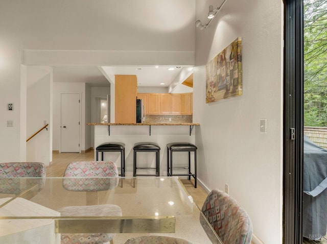 dining room with baseboards