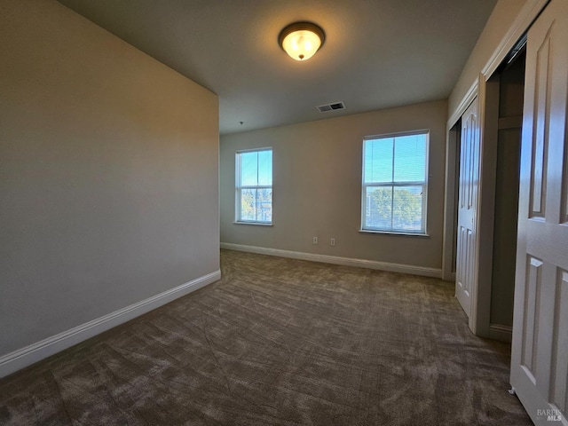43 Johnson St, Windsor, CA 95492 - spare room with visible vents, baseboards, and dark carpet