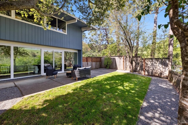 view of yard featuring a fenced backyard and a patio
