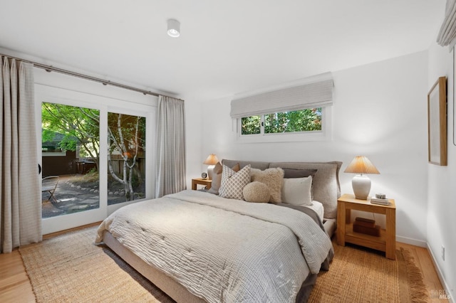 15 Glen Dr, Mill Valley, CA 94941 - bedroom featuring access to exterior, multiple windows, wood finished floors, and baseboards