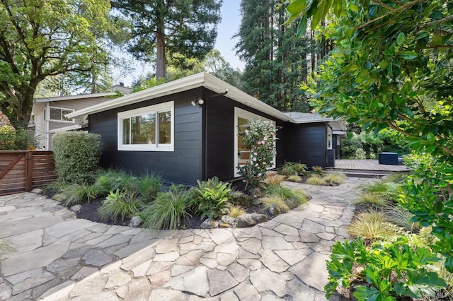 15 Glen Dr, Mill Valley, CA 94941 - view of side of home featuring fence and a chimney