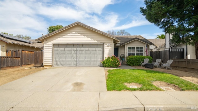 1864 Quail Meadows Cir, Vacaville, CA 95687 - ranch-style house featuring a tiled roof, an attached garage, fence, and driveway