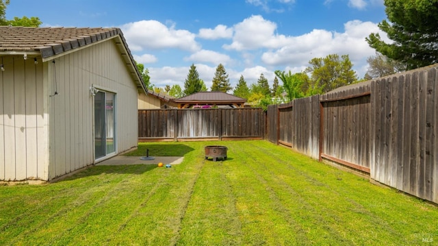 1864 Quail Meadows Cir, Vacaville, CA 95687 - view of yard with a fire pit and a fenced backyard