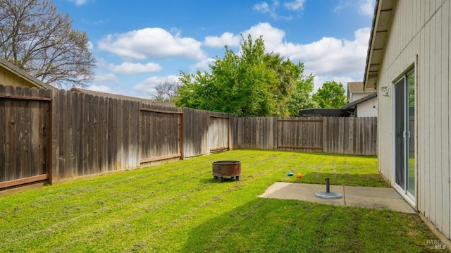 1864 Quail Meadows Cir, Vacaville, CA 95687 - view of yard with an outdoor fire pit and a fenced backyard