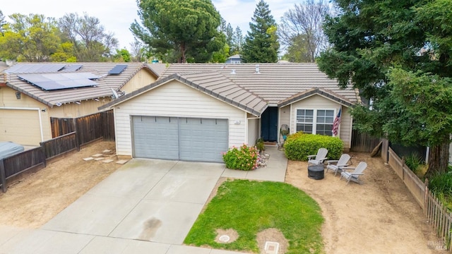 1864 Quail Meadows Cir, Vacaville, CA 95687 - ranch-style house with driveway, fence, an attached garage, and a tile roof