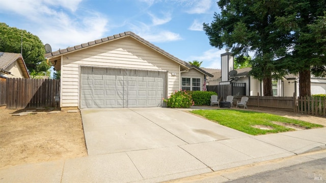 1864 Quail Meadows Cir, Vacaville, CA 95687 - ranch-style home with fence, a garage, and concrete driveway