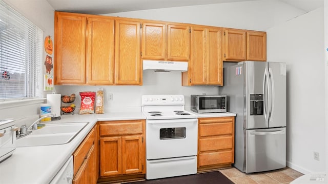 1864 Quail Meadows Cir, Vacaville, CA 95687 - kitchen featuring baseboards, a sink, light countertops, appliances with stainless steel finishes, and under cabinet range hood