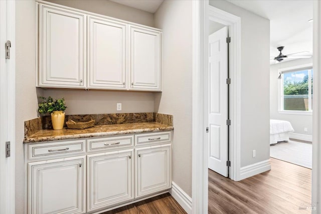 1012 Capitola Ct, Vacaville, CA 95687 - bar area featuring dark wood-type flooring and ceiling fan