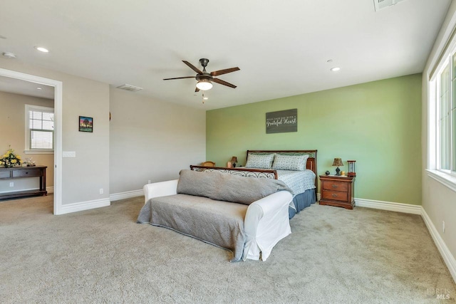 carpeted bedroom featuring visible vents, baseboards, recessed lighting, and ceiling fan