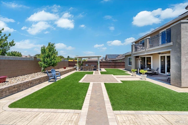 1012 Capitola Ct, Vacaville, CA 95687 - fenced backyard featuring a balcony, a patio area, and ceiling fan